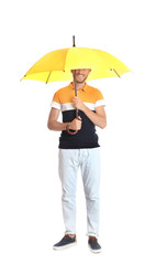 Man with yellow umbrella on white background