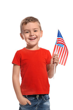 Little boy with American flag on white background