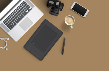 Minimal work space : Laptop, camera, coffee, camera, pen, pencil, notebook, smartphone, stationery on brown background for copy space.