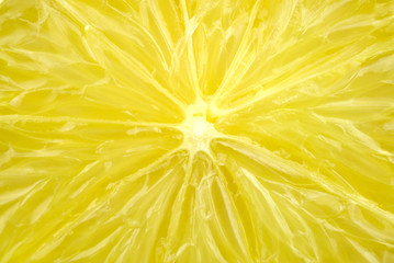 Macro detail of fresh juicy lemon - obrazy, fototapety, plakaty