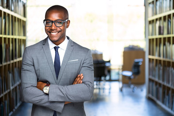 Friendly warm portrait of african american legal representative at practice with copy space
