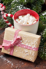Christmas gift box and hot chocolate with marshmallow
