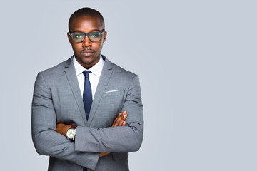 Isolated serious african american business man, lawyer, attorney looking strong and confident