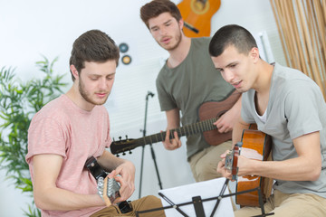 men playing guitar