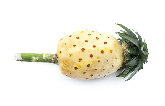 peeled pineapple and fresh ripe pineapple isolated on white background