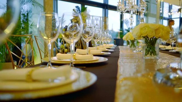decorated and served table in a luxury restaurant before wedding feast