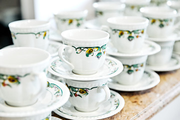 Mugs with a picture on a saucer