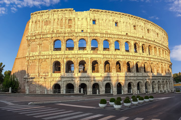 Fototapeta na wymiar Roman Colosseum under the blue sky, Rome, Italy
