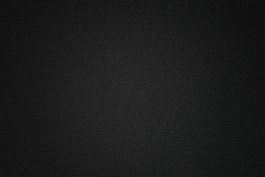 Black texture of synthetic fabric. Textile background.