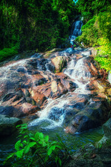 Obraz premium Waterfall with pool in tropical jungle, Na Muang, Koh Samui