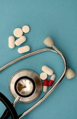 used stethoscope and pharmacy pills