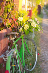 Fototapeta na wymiar Bike with autumn flowers