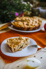Homemade apple pie. Autumn composition with apples and pie. Autumn dessert.
