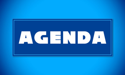 Agenda - clear white text written on blue card on blue background