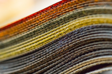 Catalog of multicolored cloth from matting fabric texture background, silk fabric texture, textile industry background