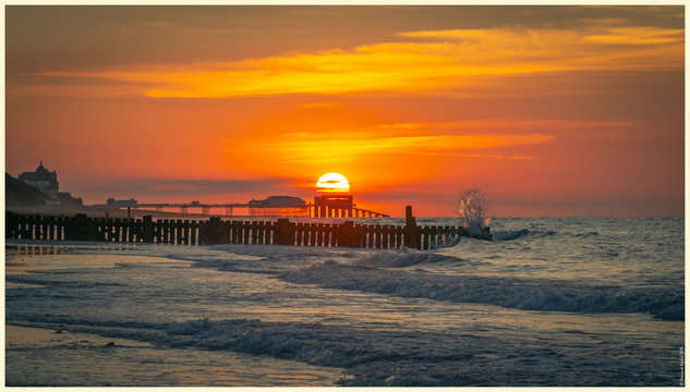 Pier sunset on the beach