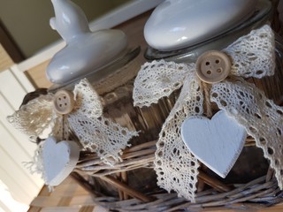 Decorative glass jars with a wooden heart