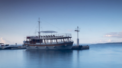 Fototapeta premium Anchored cruise ship in the harbor