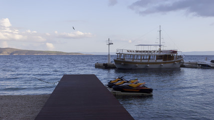 Fototapeta premium Anchored cruise ship and water scooters (2)