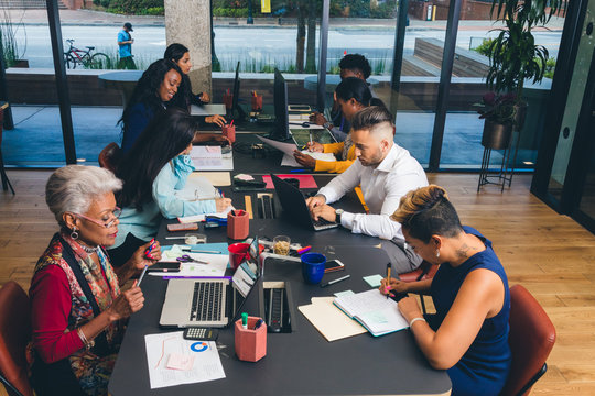 Group Of Business People Working Together In Office