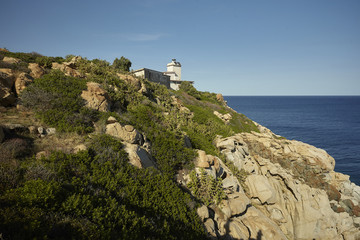 The lighthouse on the promontory in Capo Ferrato