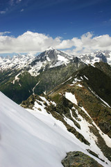 Landscape of high mountains on a spring day.