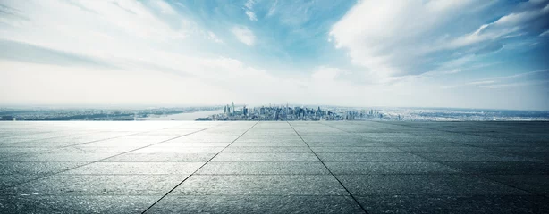 Fotobehang empty floor with modern cityscape in new york © zhu difeng