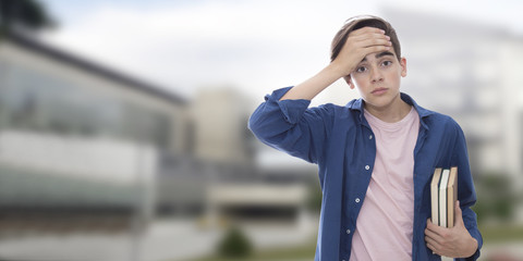 modern student with books on outdoor background