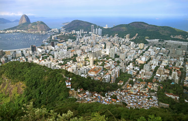 Aerial view of Rio de Janeiro Cityscape with the famous Sugarloaf mountain in the distance, Brazil, South America 