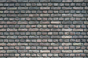 Fototapeta premium Dark gray stone wall, background, texture. Old gray brick wall texture background