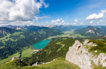Fototapeta na wymiar Panoramic view on Haldensee and the valley of Tannheim from Schartschrofen in the austrian Alps