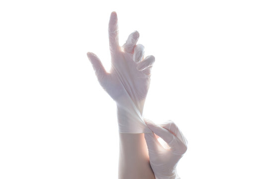 Experiment science people point show up concept. Close up photo of professional experienced doctor putting on white sterile rubber gloves isolated on white background copyspace empty blank place