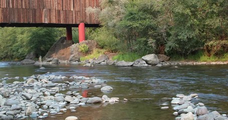 Creek under covered bridge