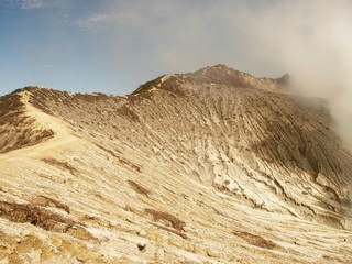 view on the crater of the Ijen volcano in Java, Indonesia, a sulfur mine and toxic gaz
