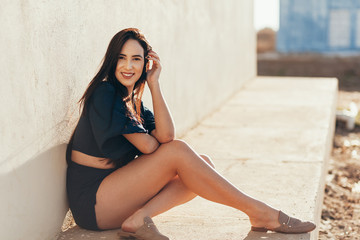 Portrait of a beautiful young smiling girl outdoor