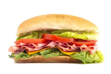 Ham Sandwich with Lettuce Cheese and Tomatoes on a White Bun