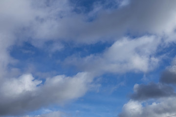 white clouds on blue sky