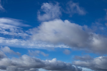 white clouds on blue sky