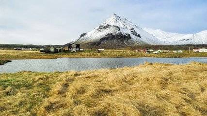 Snæfellsnes Peninsula Fishing Village and mountains with snow at western Iceland