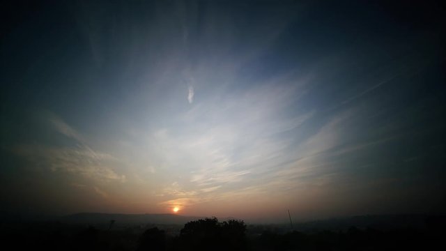 Clouds on sunrise sky time lapse