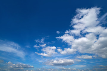 Blue sky white summer cumulus clouds