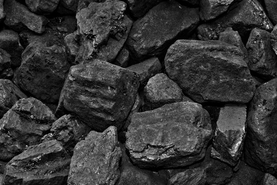 A heap of black natural coal background