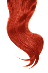 Curl of natural red hair on white background. Wavy ponytail
