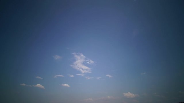 Clouds on blue sky time lapse