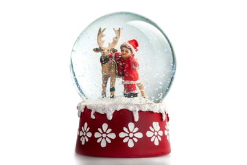 Snow globe with a child and a reindeer