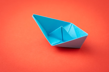 Red ocean business competition, survive success or winner company metaphor concept, blue origami...