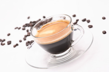 hot coffee  in clear glass on a white background in the studio.	