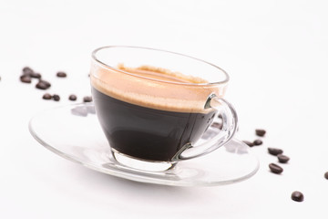 hot coffee  in clear glass on a white background in the studio.	