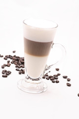 Hot Cappuccino  coffee  in clear glass on a white background in the studio.	