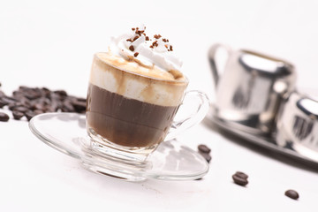hot coffee Espresso Con Panna  in clear glass on a white background in the studio.	